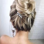 elegant-high-bun-wedding-hair-min