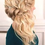 side-swept-curls-braided-wedding-hairstyle-min