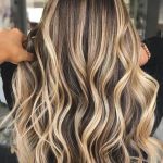 golden-highlights-brunette-hair-min