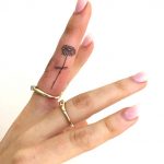 minimal-flower-hand-tattoo