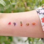 small-colored-fruit-tattoo-idea